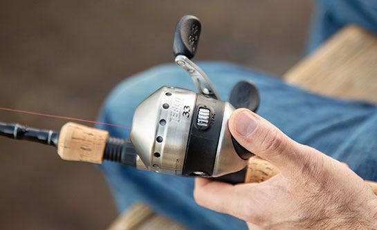 How to line a spincast fishing reel(push button) 
